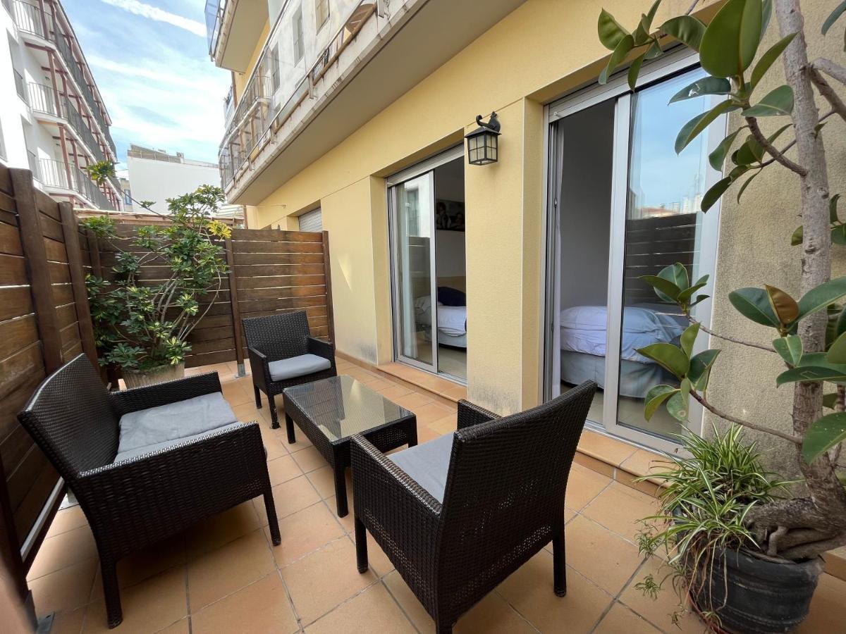 Neptuno Apartments Calella Bagian luar foto